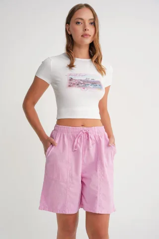 Hoch taillierte Baumwoll-Drawstring-Mini-Shorts