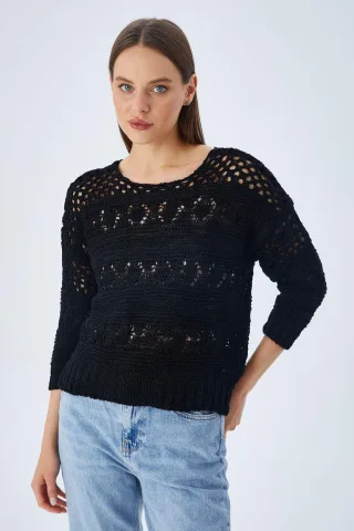 Löcherstrickpullover