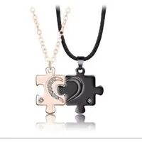 KARMA Freundschaftskette Partnerketten Herz-Puzzle Paarschmuck (Pärchenschmuck Valentinstag, 4-tlg., Liebesketten Verlobung Liebe Paar), Freundschaft Liebe Halsketten Herz silber schwarz
