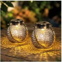 Haushalt International LED Solarleuchte, LED-Leuchtmittel fest verbaut, Warmweiß, LED Solarlampe Glas Außenlampe Gartendeko Laterne klar D 10,5cm 2x