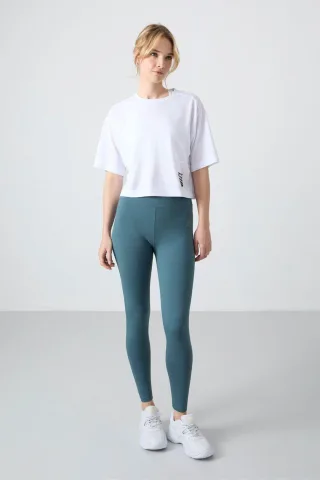 Hochgeschnittene Baumwoll-Elasthan-Leggings