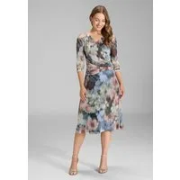 SWING Cocktailkleid - Midi Kleid aus bedrucktem Mesh in Wickel Optik Taillierter Schnitt mit fließendem Rockteil