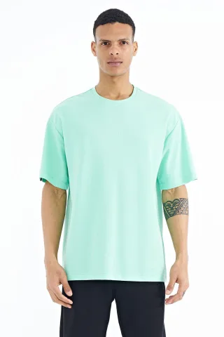 Übergroßes Baumwoll-Mischgewebe Crew-Neck T-Shirt mit Aufnäher