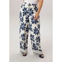 Aniston PLUS Schlupfhose mit großflächigen Blättern bedruckt