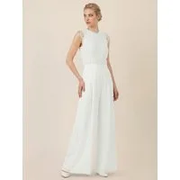 Apart Jumpsuit mit Spitzentop und weitem Bein