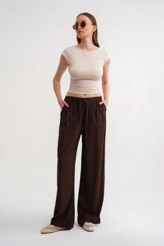 Hochtaillierte gerade Baumwollhose mit Bindebandverschluss