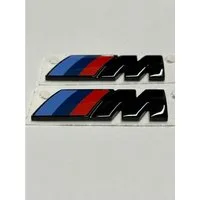 BMW Aufkleber BMW M Emblem Schwarz Glanz Kotflügel Logo Seite M Paket 55x20 LIMITED, (1tlg)
