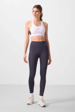 Hoch geschnittene Skinny Leggings mit Tasche