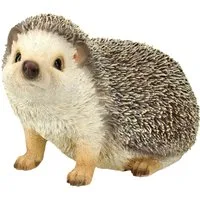 Figuren Shop GmbH Tierfigur Gartenfigur - Igel schaut neugierig - Tierfigur HotAnt Dekofigur Deko