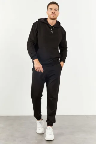 Übergroßer Kapuzen-Sweatshirt- und Hosenanzug