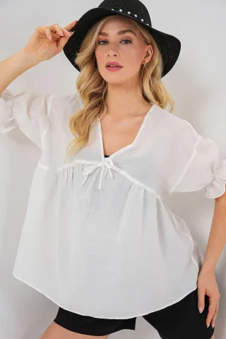Strukturierte V-Ausschnitt-Bluse mit Schleife
