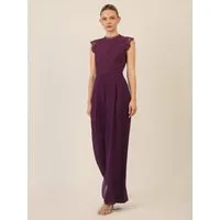Apart Jumpsuit mit Spitzenoberteil und weitem Bein
