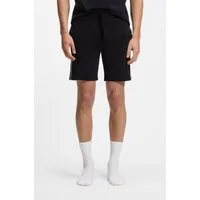 BOSS Schlafshorts Unique Stretch-cotton pyjama bottoms mit signature-stripe tape