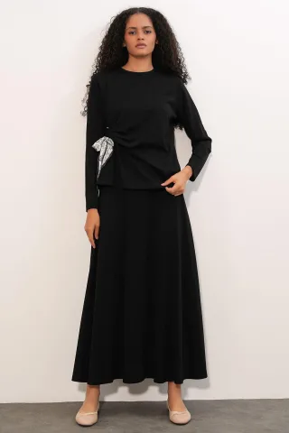Langärmlige Bluse und weite Hose Koordinatensatz