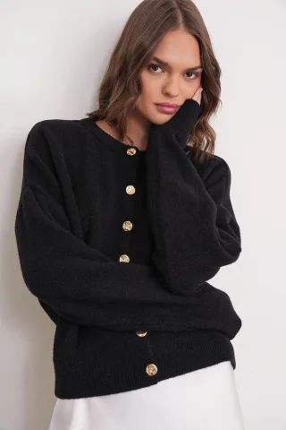 Knopffreier gerippter Strick-Cardigan