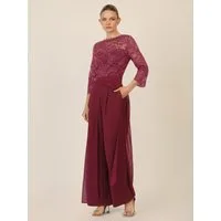 Apart Jumpsuit mit Spitzentop und weitem Bein