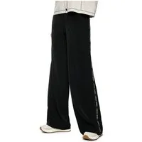 Marc Cain Schlupfhose Golden Hour Premium Damenmode Model: WELKOM mit Logostreifen