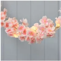 Lights4fun Girlanden Batteriebetriebene LED-Blumengirlande mit Timer in Pastellrosa