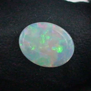 0,62 ct White Opal Multicolor Vollopal aus Coober Pedy Fire