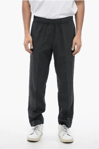 REM Slim Fit Hose aus zerknitterter Baumwolle in Grau