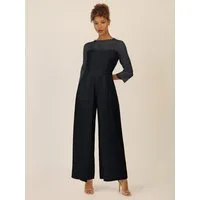 Apart Jumpsuit mit Spitzentop und weitem Bein