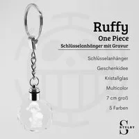 Stelby Schlüsselanhänger mit Gravur OnePiece Schlüsselanhänger Ruffy Multicolor LED mit Geschenkbox (Perfekt für Geburtstage und Weihnachten, 1-tlg., Robustes Glasmaterial, leuchtet in 5 Farben), Farbwechsel, langlebig, modernes Design