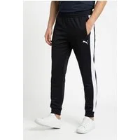 PUMA Trainingshose T7 FOUNDATION CL POLY KNITTED PANTS mit Eingrifftaschen, Regular Fit, sportlicher Stil