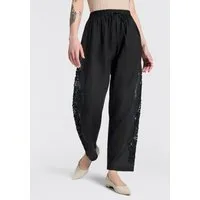 BOSS ORANGE Schlupfhose Trika Premium Damenmode mit dekorativer Lochstickerei, Barrel Shape