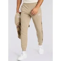 PUMA Trainingshose ESS CAMO SWEATPANTS FL CL Regular Fit, mit Eingrifftaschen, sportlicher Stil