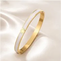 XCOAST Armreif Luxus Damen Edelstahl-Armband Fliederfarben – 18K vergoldeter Armreif (Armreif Damen rosé gold Edelstahl, mit Schmucktasche), rosé Armband Damen elegant, 18K vergoldet edel