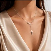 XCOAST Statementkette Infinity Damen – Unendlichkeitsschleife & Kreuz (statementkette damen silber infinity, Geschenkidee), Silber, elegant minimalistisch
