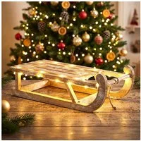 Spetebo LED Dekoobjekt LED Holz Deko Schlitten natur - 50 x 23 cm, Timerfunktion, LED fest integriert, warm weiß, batteriebetrieben