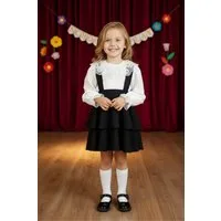 Parla Kids Shirt & Rock Schwarzes Kleid mit Trägern dazu weiße langarm Bluse mit Spitzendetail