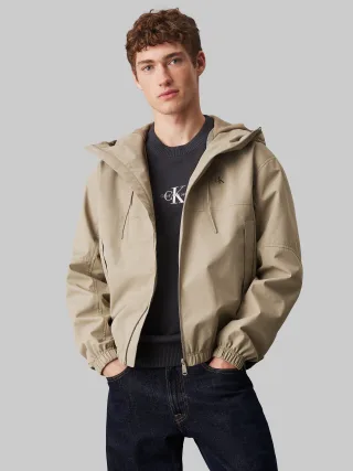 Calvin Klein Jeans Allwetterjacke "TECHNICAL JACKET" mit Kapuze Logodruck, Eingriffstaschen