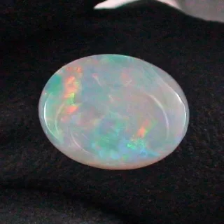 0,88 ct White Opal Multicolor Vollopal aus Coober Pedy Fire