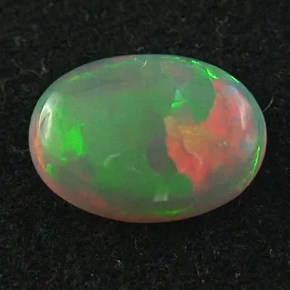 7,45 ct Welo Opal Schmuckstein Edelstein - Grün Roter Opalstein aus Afrika