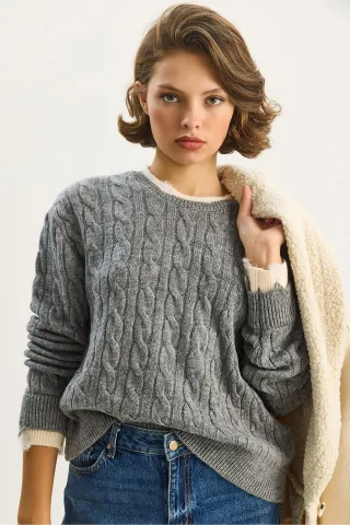 Haarzopf-Muster-Pullover