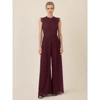 Apart Jumpsuit mit Spitzentop und weitem Bein
