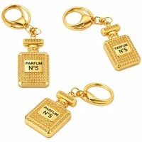 what the shop Schlüsselanhänger Taschenanhänger Parfum Look Gold mit Kristallen, ikonisches Parfum No 5 Flakon Design