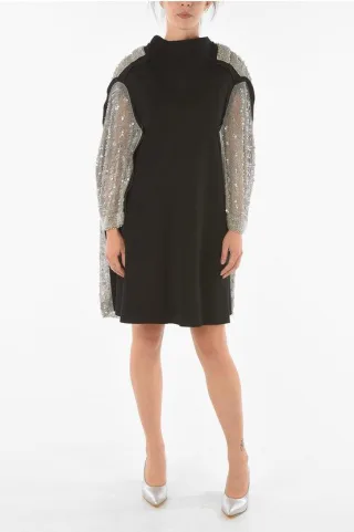 Schwarzes Midikleid mit Pailletten und Perlen an der Rückseite und an den Ärmeln