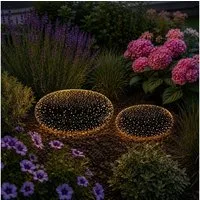 Online-Fuchs LED Dekolicht - 2 "Steine" aus Glas mit LED-Beleuchtung & Timer - Gartendekoration, Dauerleuchten oder seichter Funkeleffekt wählbar, warmweiße Beleuchtung, stilvolles im Lichtspiel im Garten, auf der Terrasse oder dem Balkon