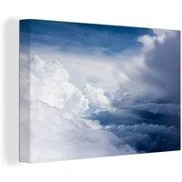 OneMillionCanvasses® Leinwandbild Große weiße Wolken an einem dunkelblauen Himmel, Fotodruck (1 St), Leinwand Bilder Klein, Wand Dekoration Aesthetic 30x20 cm
