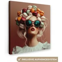 OneMillionCanvasses® Leinwandbild Frau - Makronen - Brille - Küche, Fotodruck (1 St), Wandbild, Deko Schlafzimmer Wohnzimmer Flur 20x20 cm