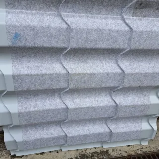Pfannenblech Typ Europa | Anti-Tropf 1000 g/m² | 1,15 m Länge | Oxidrot ( RAL 3009 )