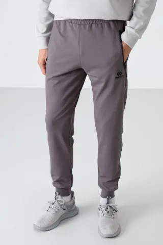 Herren Unifarbene Sweatpants mit Reißverschlusstasche