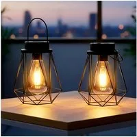 Spetebo LED Laterne Solar Laterne schwarz 18 x 15 cm zum Hängen oder Stellen, der Akku ist austauschbar, LED fest integriert, warm weiß, mit Einschaltautomatik