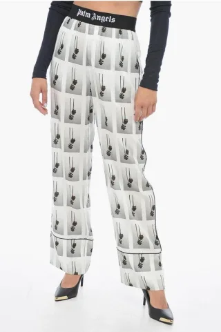 Pyjamahose MIRAGE mit Allover-Logo in Schwarz und Weiß