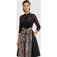 Apart Dirndl aus Samt und Satin mit Leo-Schürze